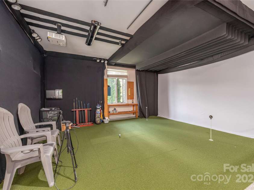 31 Chickering Lane, Waynesville, NC 28786.  MLS# CAR4278199, YatesRealty ID 32361. Golf Simulator top-of-the-line