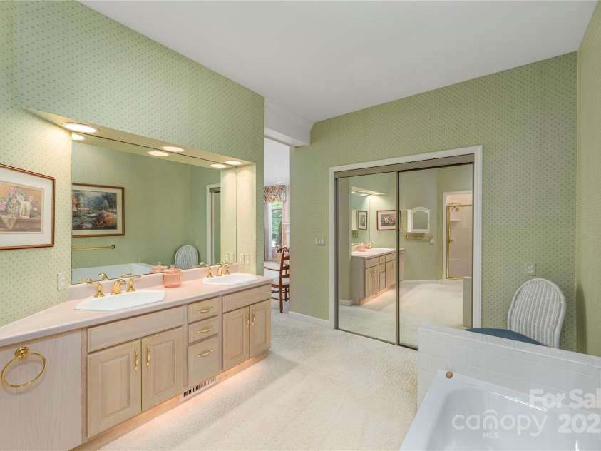 31 Chickering Lane, Waynesville, NC 28786.  MLS# CAR4278199, YatesRealty ID 32361. Primary Bath with walk-in closet