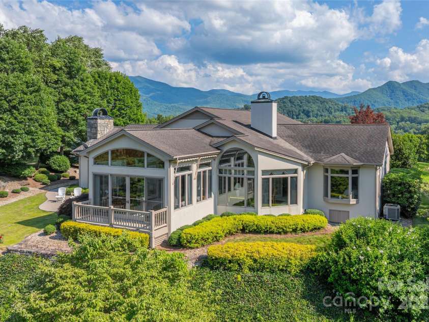 31 Chickering Lane, Waynesville, NC 28786.  MLS# CAR4278199, YatesRealty ID 32361. Rear of home - Balsams in the background