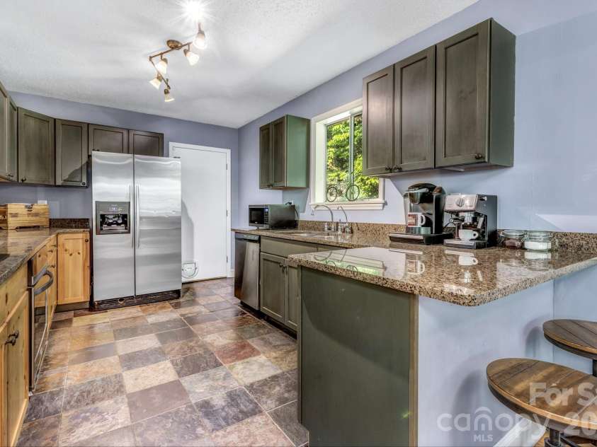 125 Hondah Boulevard, Brevard, NC 28712.  MLS# CAR4395240, YatesRealty ID 32363. 