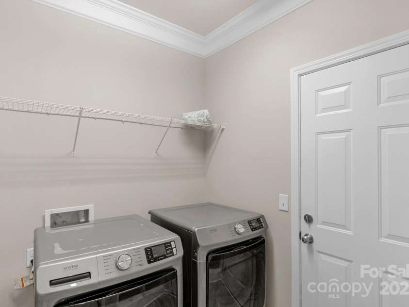 10604 Waxhaw Manor Drive, Waxhaw, NC 28173.  MLS# CAR4287173, YatesRealty ID 32364. Main Floor laundry room