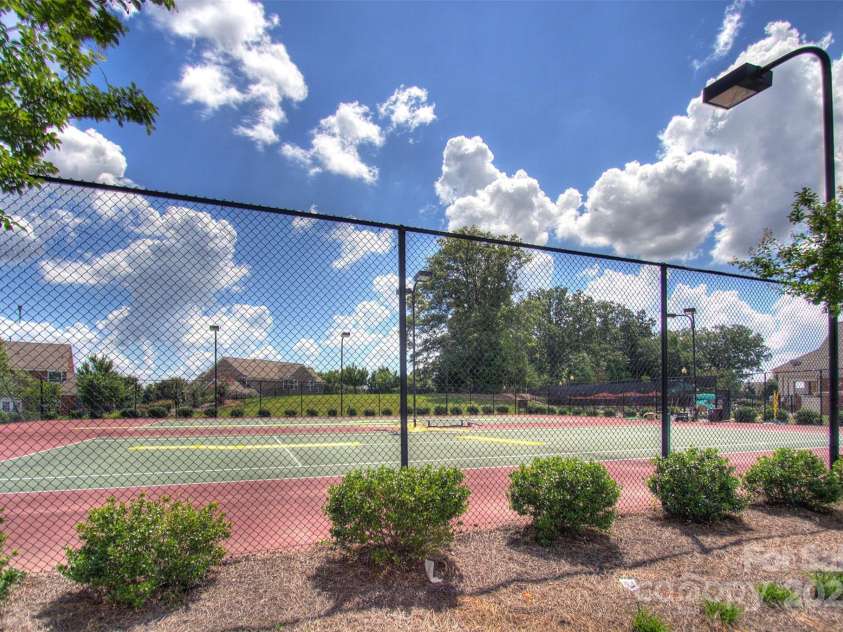 10604 Waxhaw Manor Drive, Waxhaw, NC 28173.  MLS# CAR4287173, YatesRealty ID 32364. Tennis Pickle ball court