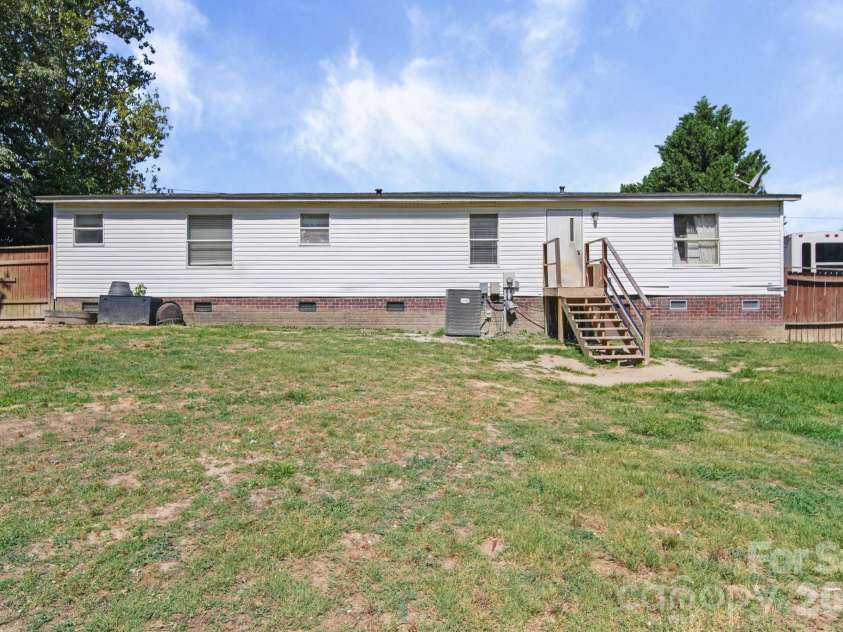 231 Zion Church Road, Gold Hill, NC 28071.  MLS# CAR4394429, YatesRealty ID 32365. Backyard