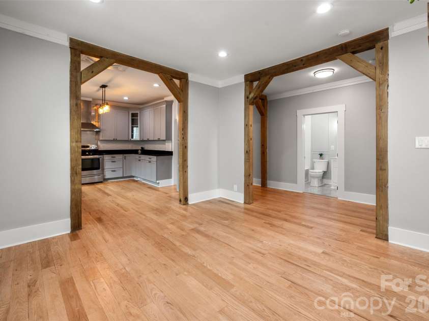 174 Tournament Drive, Concord, NC 28025.  MLS# CAR4385938, YatesRealty ID 32368. Custom beams in the dining room