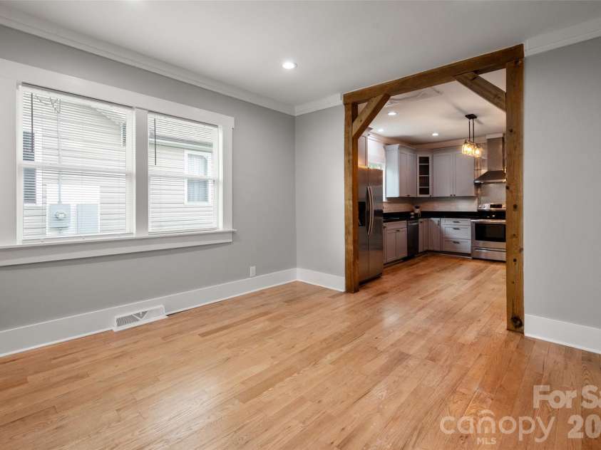 174 Tournament Drive, Concord, NC 28025.  MLS# CAR4385938, YatesRealty ID 32368. Custom beams in the dining room
