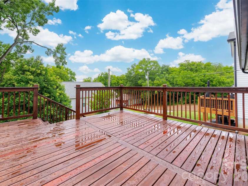 174 Tournament Drive, Concord, NC 28025.  MLS# CAR4385938, YatesRealty ID 32368. Custom deck