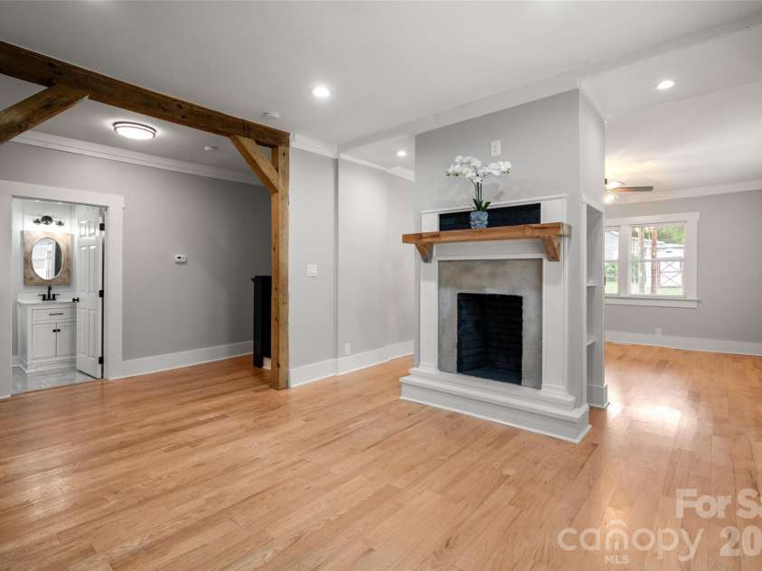 174 Tournament Drive, Concord, NC 28025.  MLS# CAR4385938, YatesRealty ID 32368. Double sided fireplace in the dining room