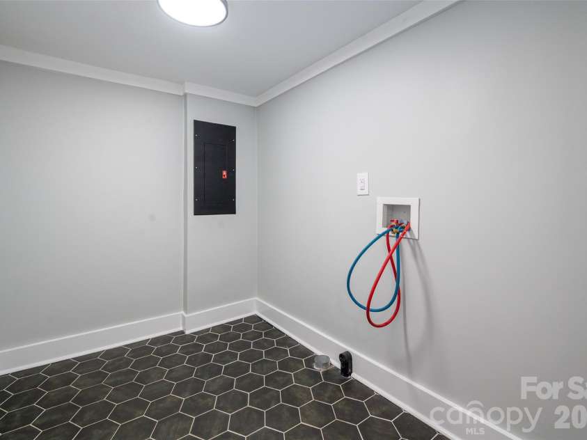 174 Tournament Drive, Concord, NC 28025.  MLS# CAR4385938, YatesRealty ID 32368. Laundry room