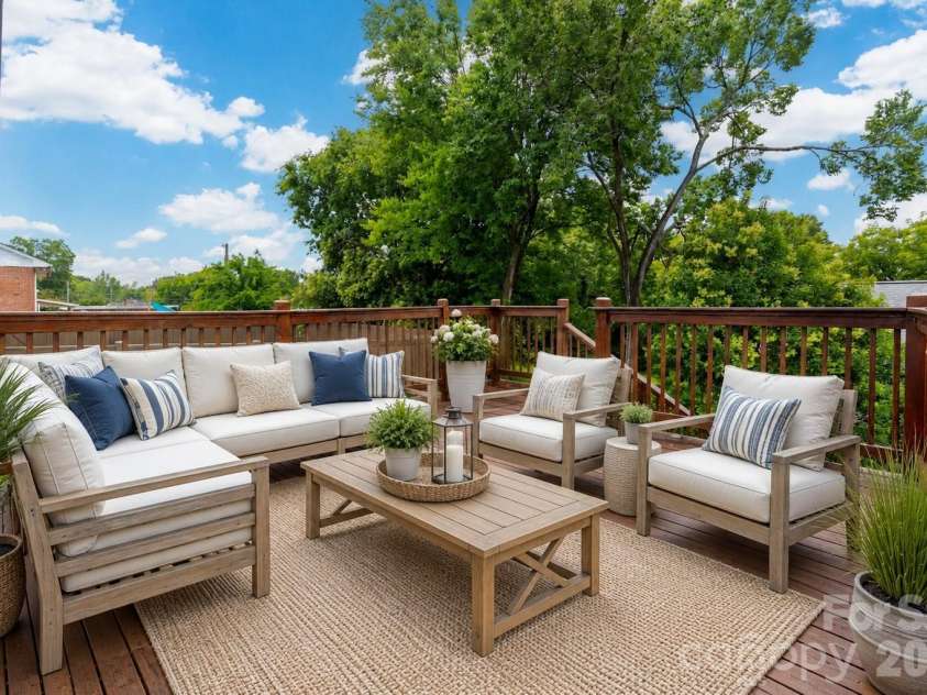 174 Tournament Drive, Concord, NC 28025.  MLS# CAR4385938, YatesRealty ID 32368. Virtually staged custom deck
