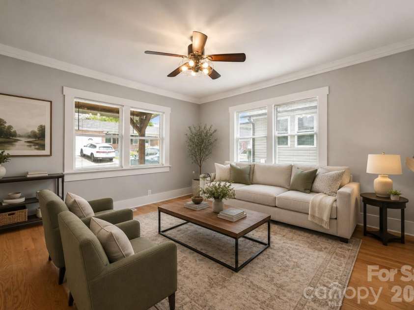 174 Tournament Drive, Concord, NC 28025.  MLS# CAR4385938, YatesRealty ID 32368. Virtually staged living room