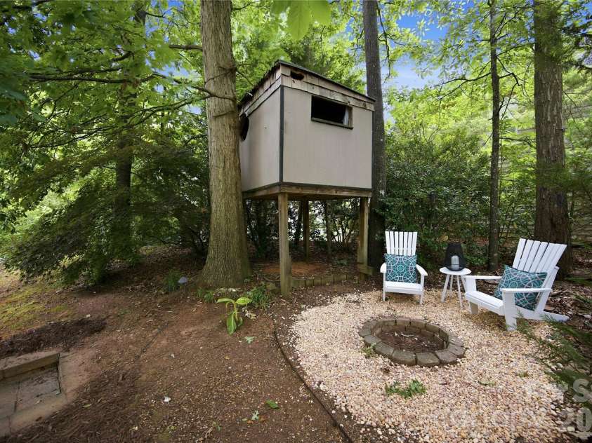 12440 Kane Alexander Drive, Huntersville, NC 28078.  MLS# CAR4390522, YatesRealty ID 32369. Yes, a tree fort! Along with a fire pit.