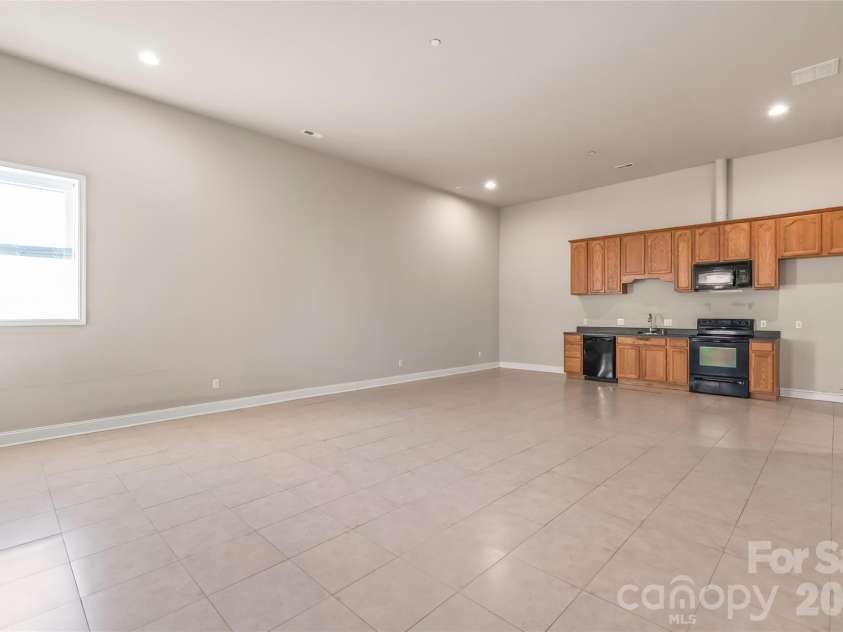 424 Rollingbrook Road, Kings Mountain, NC 28086.  MLS# CAR4318684, YatesRealty ID 3237. Secondary living quarter great room / kitchen / dining
