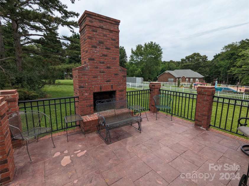 5916 Meadowmere Drive, Monroe, NC 28110.  MLS# CAR4142140, YatesRealty ID 3237. Outdoor Fireplace