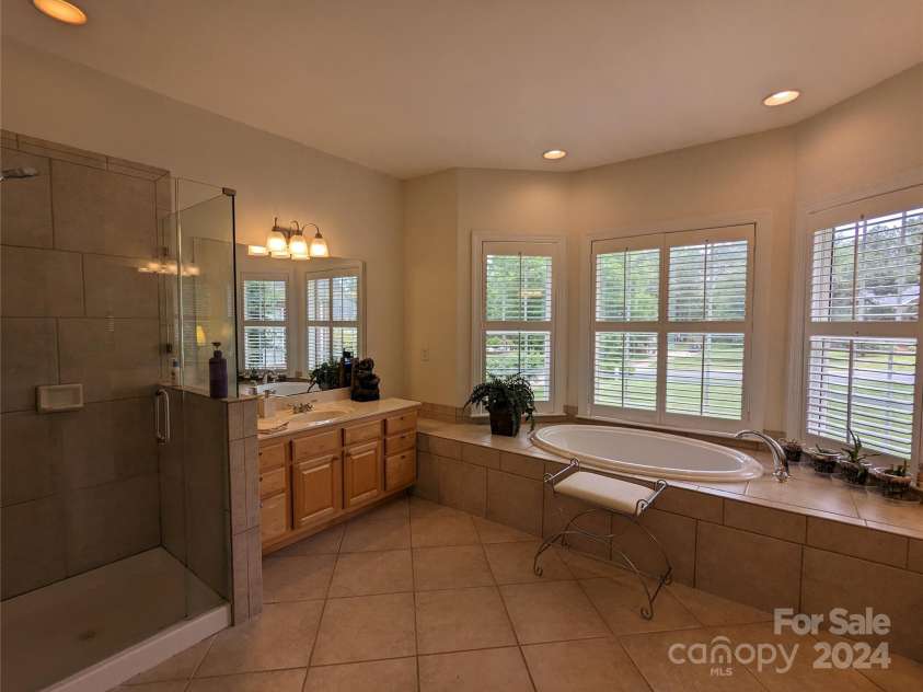 5916 Meadowmere Drive, Monroe, NC 28110.  MLS# CAR4142140, YatesRealty ID 3237. Oversized Shower & 2nd Vanity