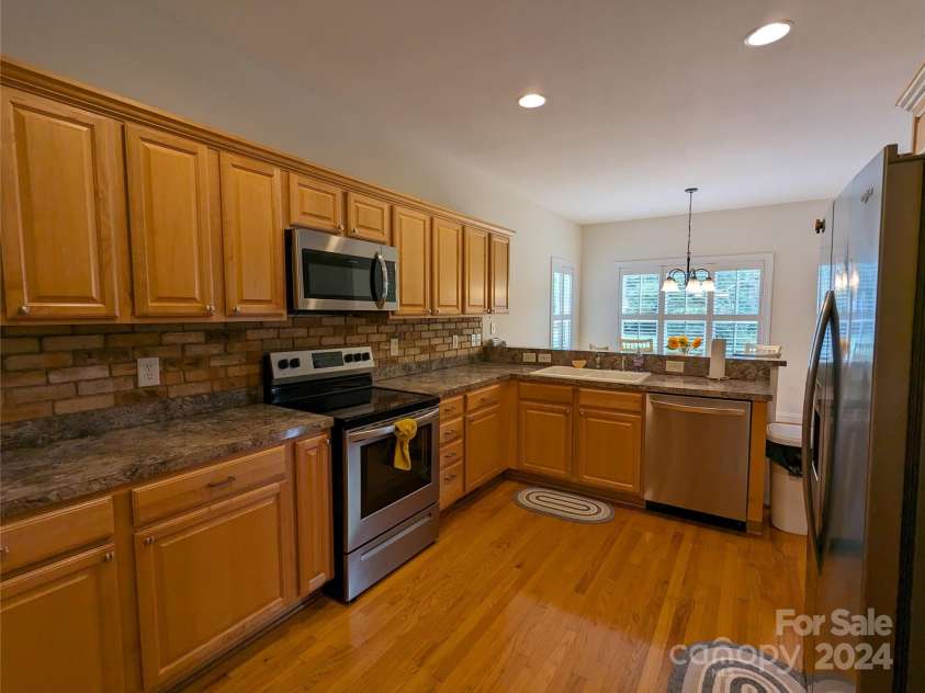5916 Meadowmere Drive, Monroe, NC 28110.  MLS# CAR4142140, YatesRealty ID 3237. Tons of Kitchen storage & SS appliances