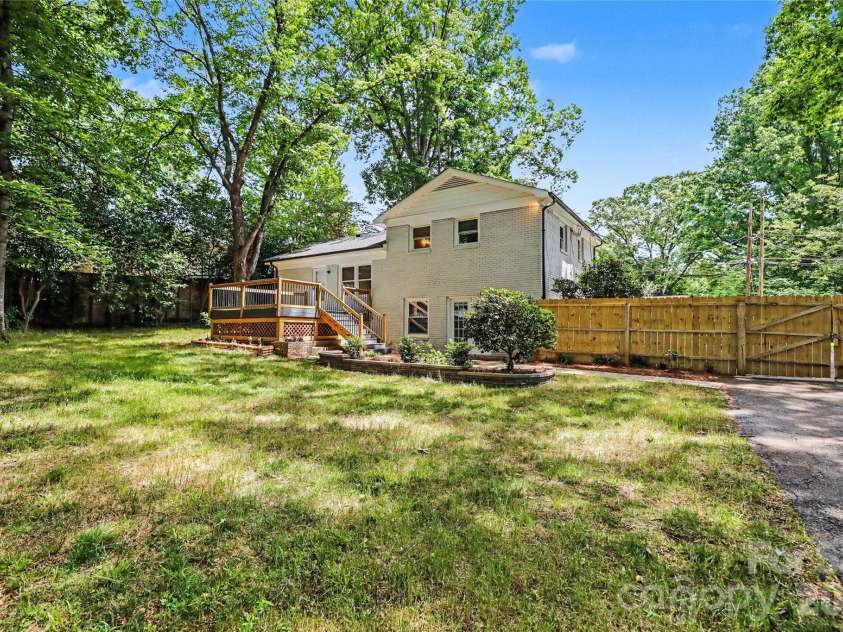 1410 Burnley Road, Charlotte, NC 28210.  MLS# CAR4380063, YatesRealty ID 32378. Back Yard Deck and Patio