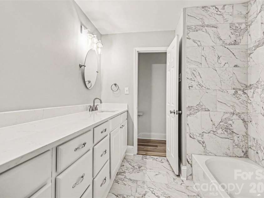1410 Burnley Road, Charlotte, NC 28210.  MLS# CAR4380063, YatesRealty ID 32378. Primary Bath