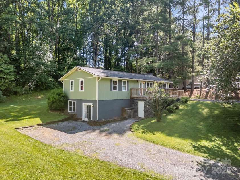 64 Christopher Lane, Sylva, NC 28779.  MLS# CAR4274433, YatesRealty ID 32378. Lower Driveway