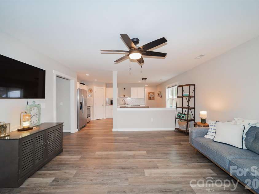 1338 Eastside Avenue, Albemarle, NC 28001.  MLS# CAR4342335, YatesRealty ID 3238. Modern finishes and a thoughtful layout make this living room both functional and inviting.