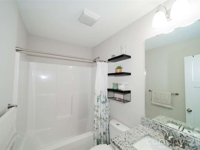 1338 Eastside Avenue, Albemarle, NC 28001.  MLS# CAR4342335, YatesRealty ID 3238. Modern finishes make this bathroom both practical and inviting for guests.