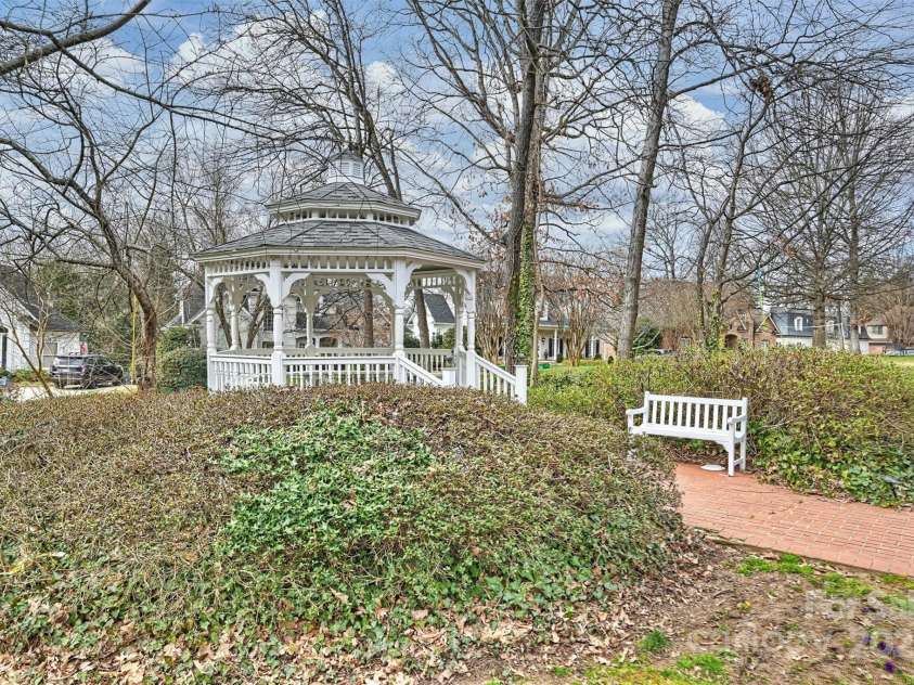 318 Canterbury Road, Charlotte, NC 28211.  MLS# CAR4231857, YatesRealty ID 3238. Adorable gazebo nestled in common area in front of the home.