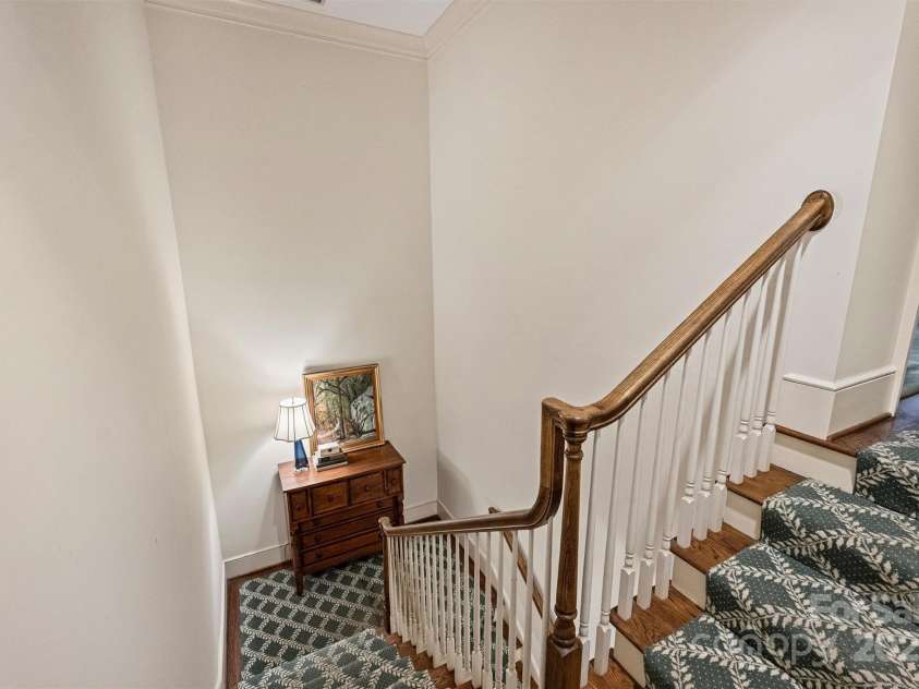 318 Canterbury Road, Charlotte, NC 28211.  MLS# CAR4231857, YatesRealty ID 3238. Stairs leading to second level.