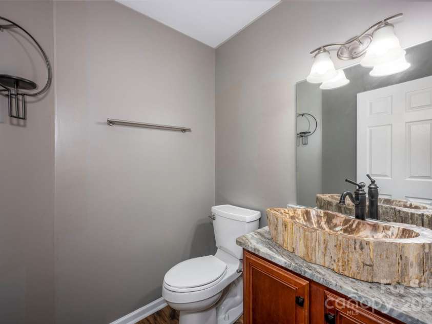 2624 Mt Isle Harbor Drive, Charlotte, NC 28214.  MLS# CAR4283520, YatesRealty ID 32381. Custom Powder Room Vanity