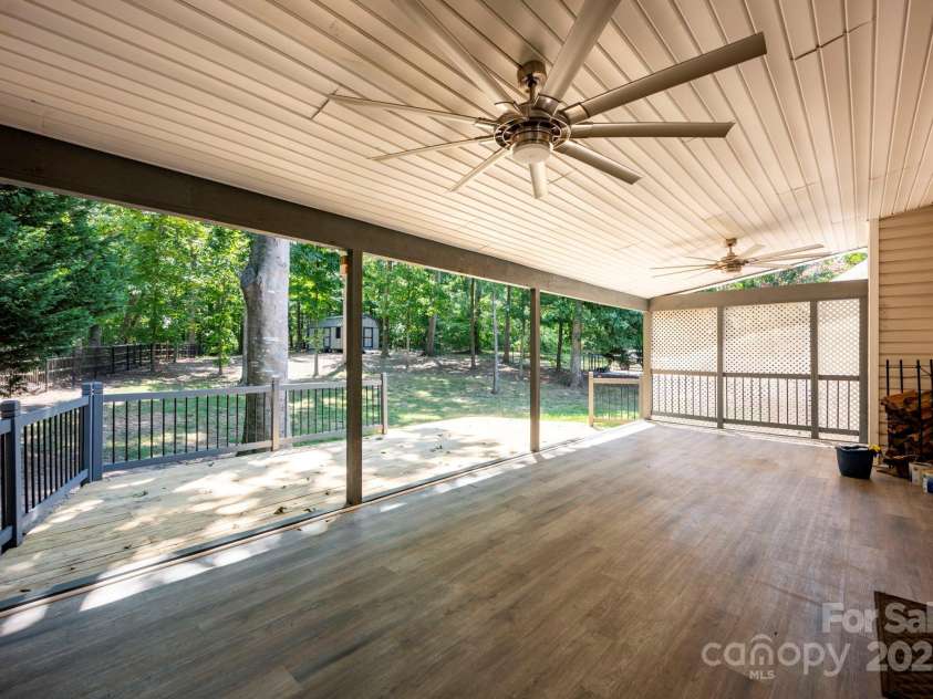 2624 Mt Isle Harbor Drive, Charlotte, NC 28214.  MLS# CAR4283520, YatesRealty ID 32381. Large oversized porch with LVP