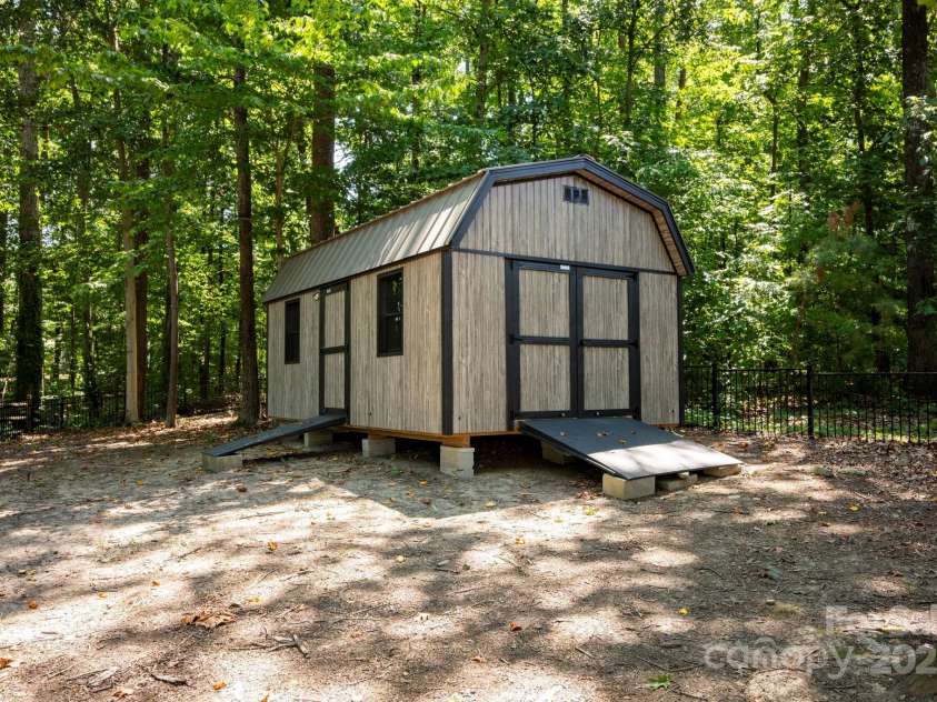 2624 Mt Isle Harbor Drive, Charlotte, NC 28214.  MLS# CAR4283520, YatesRealty ID 32381. Site Built outbuilding