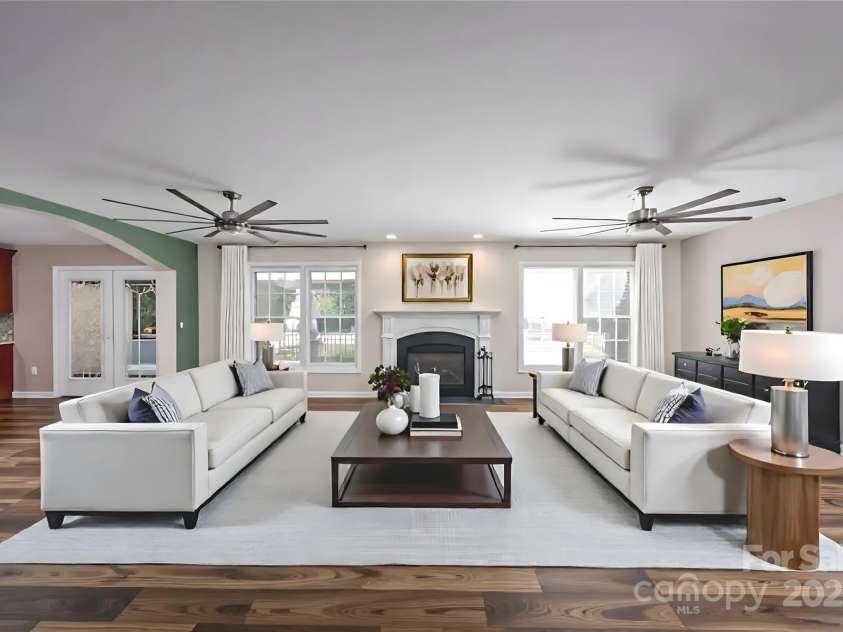 2624 Mt Isle Harbor Drive, Charlotte, NC 28214.  MLS# CAR4283520, YatesRealty ID 32381. Virtually Staged Living Room