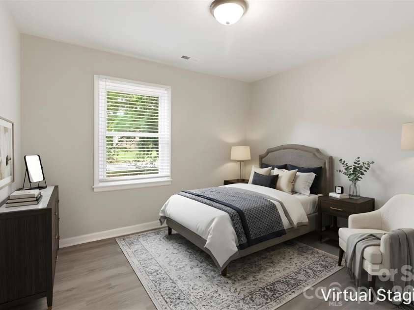 2725 Thornton Road, Charlotte, NC 28208.  MLS# CAR4394412, YatesRealty ID 32383. Walking into the second bedroom (virtually staged & enhanced).