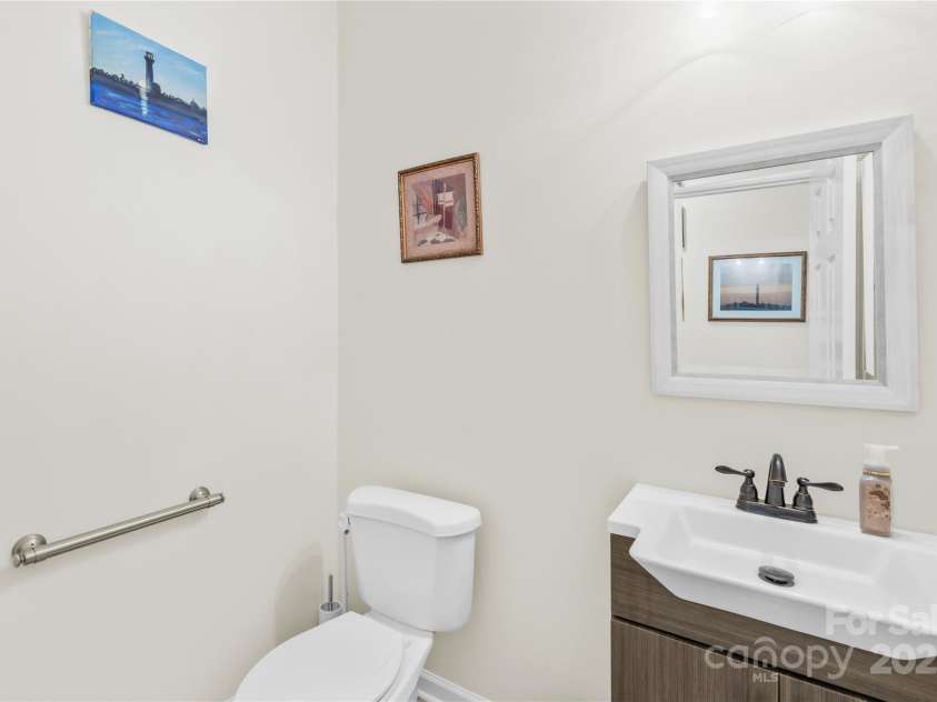 22312 John Gamble Road, Cornelius, NC 28031.  MLS# CAR4289564, YatesRealty ID 32384. Half bath on main level