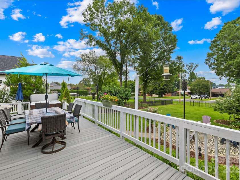 22312 John Gamble Road, Cornelius, NC 28031.  MLS# CAR4289564, YatesRealty ID 32384. Large back deck facing the back yard