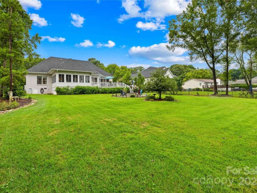 22312 John Gamble Road, Cornelius, NC 28031.  MLS# CAR4289564, YatesRealty ID 32384. Large back yard!