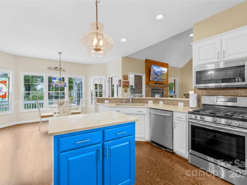 22312 John Gamble Road, Cornelius, NC 28031.  MLS# CAR4289564, YatesRealty ID 32384. Updated kitchen with island and gas stove!