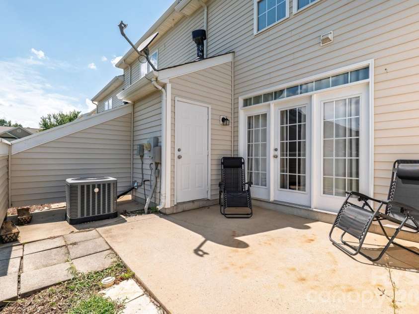 6312 Rhodins Lane, Indian Land, SC 29707.  MLS# CAR4395880, YatesRealty ID 32384. Back patio