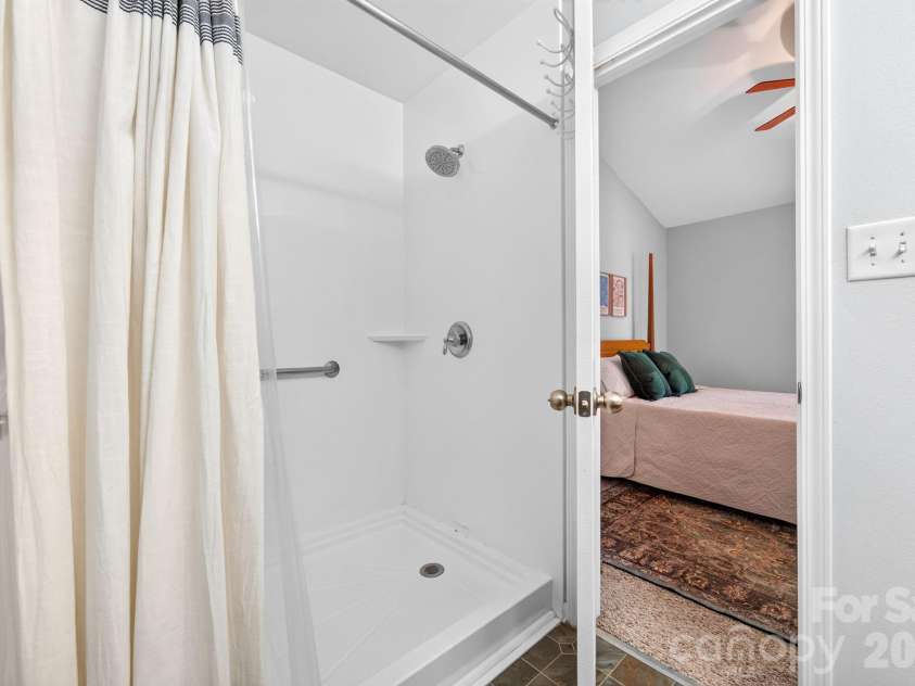 6312 Rhodins Lane, Indian Land, SC 29707.  MLS# CAR4395880, YatesRealty ID 32384. Primary bath with renovated walk-in shower