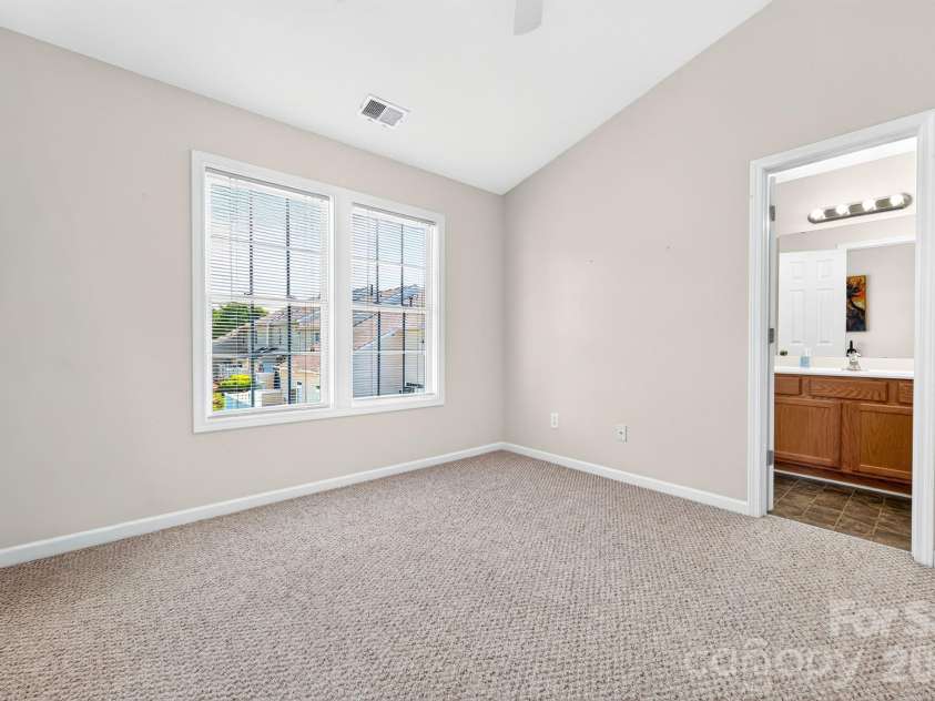 6312 Rhodins Lane, Indian Land, SC 29707.  MLS# CAR4395880, YatesRealty ID 32384. Second bedroom with vaulted ceiling and ceiling fan