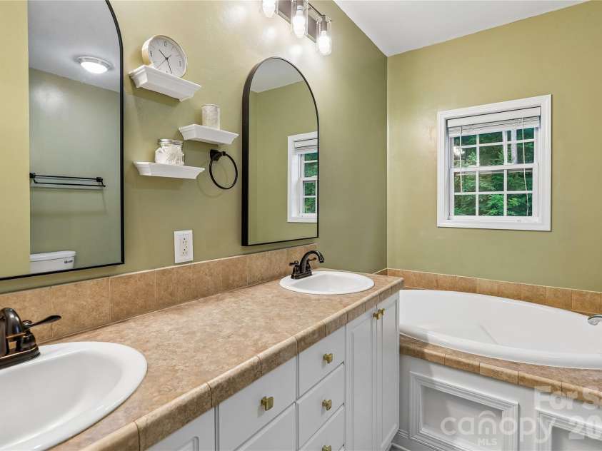 6673 Forney Hill Road, Denver, NC 28037.  MLS# CAR4382678, YatesRealty ID 32385. Spa-Like Primary Bath