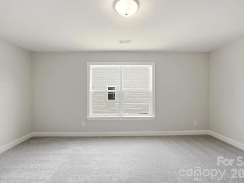 15216 First Broad Drive, Huntersville, NC 28078.  MLS# CAR4342685, YatesRealty ID 32386. Upper level bedroom