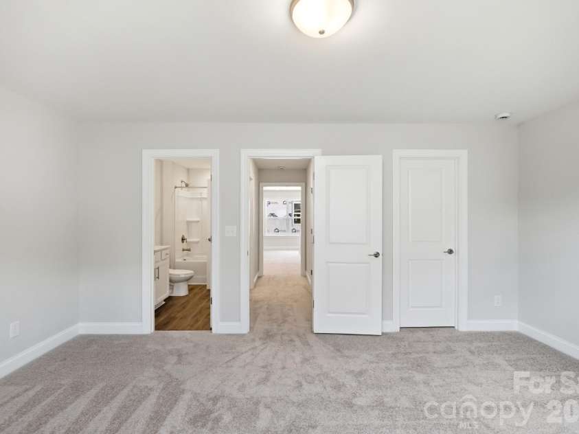 15216 First Broad Drive, Huntersville, NC 28078.  MLS# CAR4342685, YatesRealty ID 32386. Upper level bedroom
