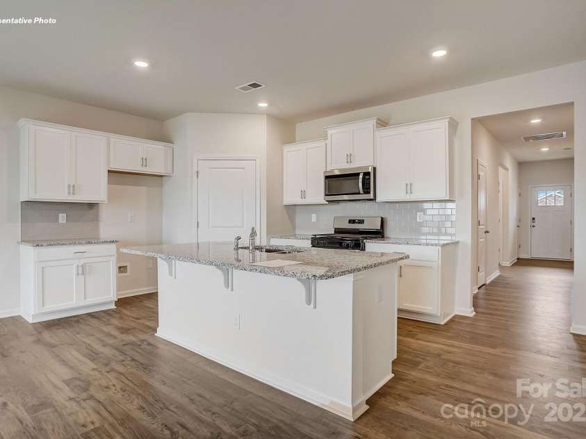 7717 Woolsey Drive, Gastonia, NC 28056.  MLS# CAR4288937, YatesRealty ID 32386. 