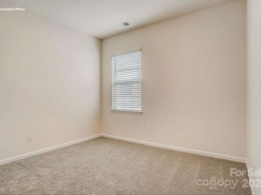 7717 Woolsey Drive, Gastonia, NC 28056.  MLS# CAR4288937, YatesRealty ID 32386. 