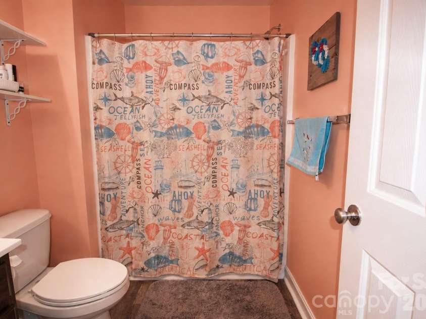 1034 Arrowhead Drive, Concord, NC 28025.  MLS# CAR4394849, YatesRealty ID 32388. Upstairs bathroom