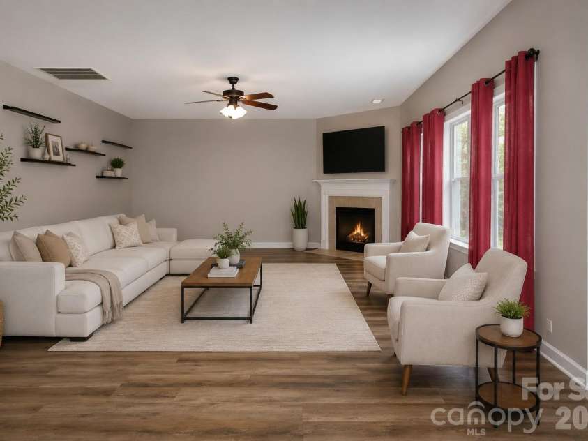 1034 Arrowhead Drive, Concord, NC 28025.  MLS# CAR4394849, YatesRealty ID 32388. Virtually Staged Living Room