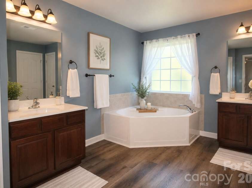 1034 Arrowhead Drive, Concord, NC 28025.  MLS# CAR4394849, YatesRealty ID 32388. Virtually staged primary bathroom