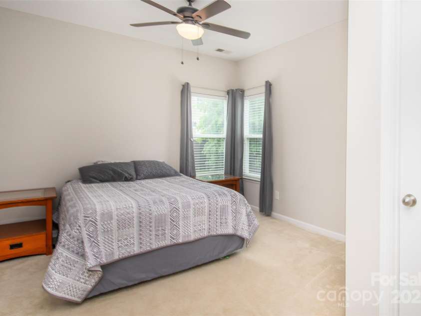 128 Millen Drive, Mooresville, NC 28115.  MLS# CAR4318597, YatesRealty ID 32390. Main floor bedroom with bath attached