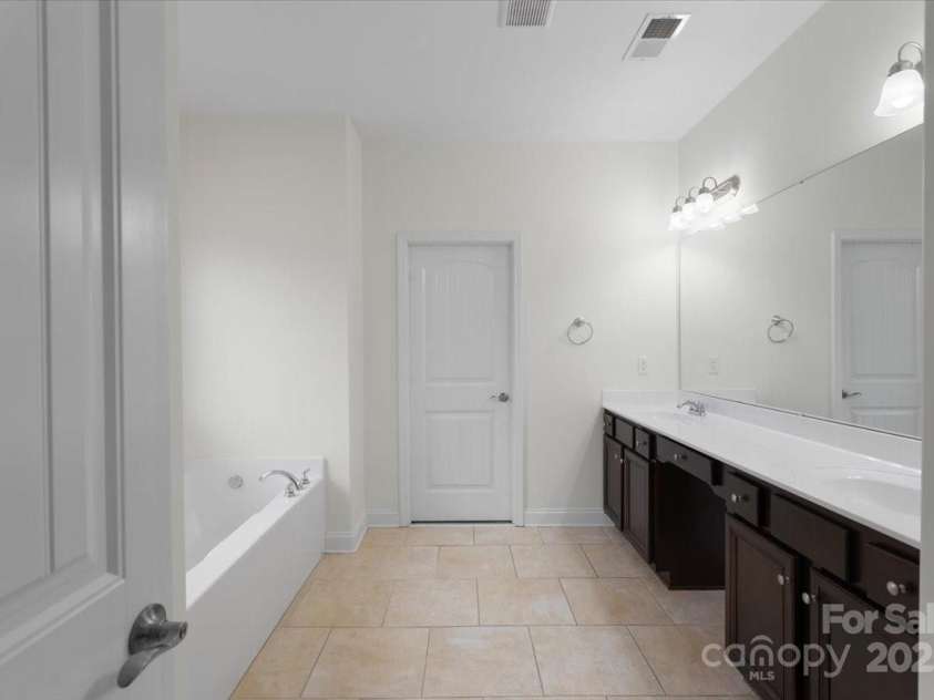 1011 Potomac Road, Indian Trail, NC 28079.  MLS# CAR4253681, YatesRealty ID 32392. Primary Bathroom