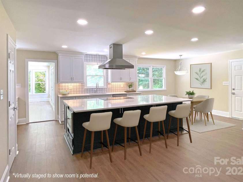 267 Winthrow Creek Road, Mooresville, NC 28115.  MLS# CAR4274339, YatesRealty ID 32394. Kitchen, Breakfast Bar, and Dining Area