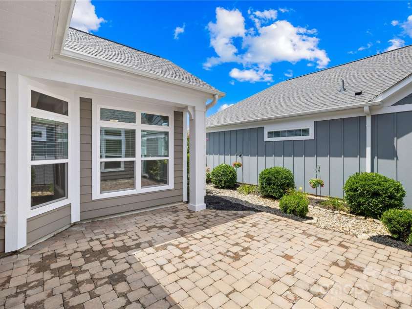 135 Valleymist Lane, Mooresville, NC 28117.  MLS# CAR4278379, YatesRealty ID 32395. Brick patio